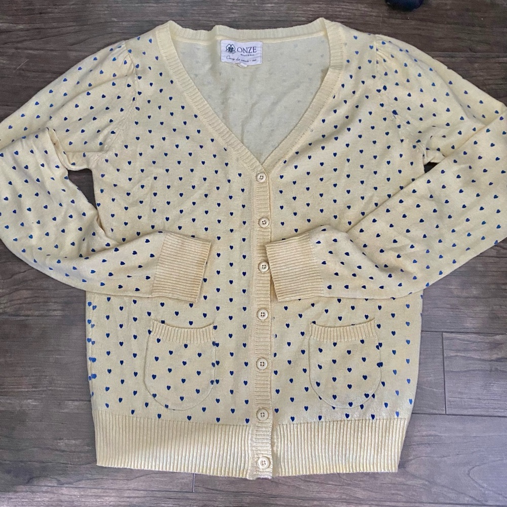Yellow cardigan with Blue hearts